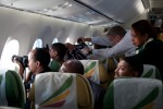 Passengers clambor for prime real estate during a pass on Mount Kilimanjaro. (Photo by Jeremy Dwyer-Lindgren)