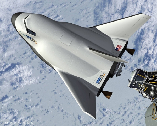 If all goes according to plan, the Dream Chaser could be one of many \'space-taxis\' that would supply transportation services to the International Space Station. (Rendering by SNC)