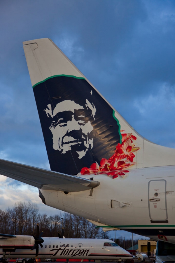 Famous Native Alaskan on Alaska Airlines planes wears a lei in honor of the new Hawaii flights.