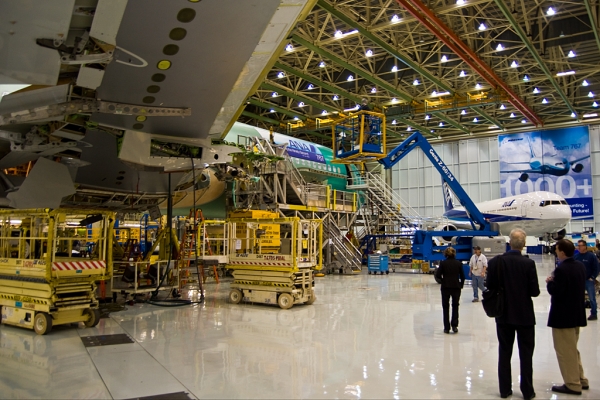 Under the wing of the 1,001st 767, viewing the entire production bay. It only holds two planes and is the first line to exit the rear of the building.
