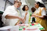 Flight attendants cut up a celebratory cake for passengers just before sunset on the flight to Addis. (Photo by Jeremy Dwyer-Lindgren)