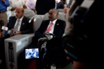 Ethiopian Airlines CEO Ato Tewold Gebremariam (L) and airline board chairman Addisu Legesse (R) are seen through the view finder of a video camera while being interviewed on board. (Photo by Jeremy Dwyer-Lindgren)