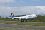 Lufthansa 747-8I takes off on a test flight. (Photo by Boeing)