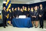 Crew of the first Lufthansa Boeing 747-8I revenue flight pose with a cake. (Photo by Cary Liao/NYCAviation)