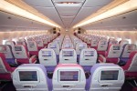Thai's new Economy class seats utilize the same Panasonic EX2 AVOD system as Royal Silk, but with a smaller 10.6-inch screen. (Photo by Liem Bahneman/NYCAviation)