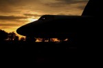 Space Shuttle Enterprise is pushed back into Hangar 12 at daybreak. (Photo by Guy Dickinson, CC BY-SA)