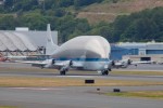 The Super Guppy then returned to Boeing Field and touched down on runway 13L and taxied to the entrance to the Museum of Flight parking lot where it was then tugged in to position for unloading. (Photo by Liem Bahneman/NYCAviation)