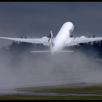A Cathay Pacific Boeing 777-300ER takes off from Washington on a delivery flight. (Photo by Jeremy Dwyer-Lindgren)