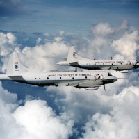 The P-3 Orion still is kicking butt with two feet, whether it's fight forest fires or flying through hurriances (above).