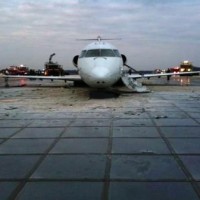 The brittle concrete EMAS system safely catches aircraft the overrun runways, just lile this CRJ. (Photo © Charleston Yeager Airport)