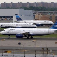 "Ole Blue Eyes" begins its way around the taxiways for a departure off of JFK's Runway 22R, along with "True Blue" and "Baby Blue." Photo by Eric Dunetz