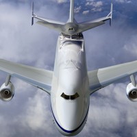 Take it easy...this is just an artist's rendition! You'll get to see the actual photos soon enough. (Artist concept courtesy of Boeing)
