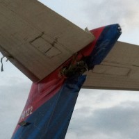Damaged tail on Delta Connection Comair CRJ-700 N641CA