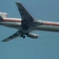 United Flight 232 on final descent, with visible damage to its tail.