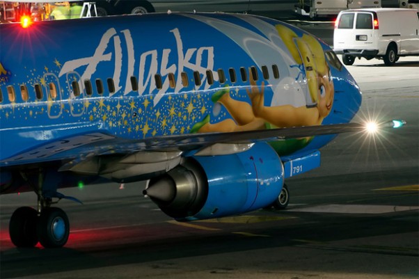 Tinkerbell actually twinkles as the Alaska Airlines Magic of Disneyland 737-400 taxis at LAX