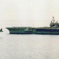 Photo of the Day: Yes, that's a B-52 bomber performing a flyby BELOW deck height of the aircraft carrier USS Ranger.