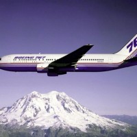 The Boeing 767 prototype (N767BA) flies over Washington's Mt. Rainier.