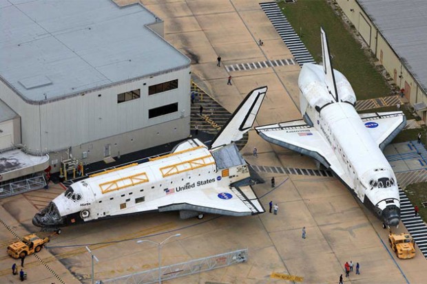 Space Shuttle Discovery passes Atlantis on her journey to the VAB, and later, the Smithsonian. For a brief few seconds, the two spacecraft were a few feet apart, a scene which will never be replicated.