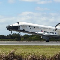 Space Shuttle Discovery touches down on Runway 15 at the Shuttle Landing Facility at NASA's Kennedy Space Center in Florida, concluding its 39th and final mission
