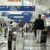 Passengers rush through O'Hare International Airport in Chicago