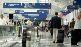 Passengers rush through O'Hare International Airport in Chicago
