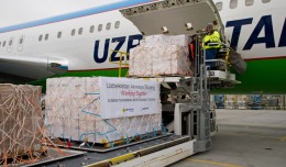 Pallets of medical supplies are loaded onto a new Uzbekistan Airways Boeing 767-300ER