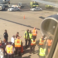 Damaged fan blades are visible in Delta 1063's right engine. (Photo by Grant Cardone, via Twitter)