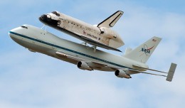 Space Shuttle Discovery hitching a ride on the Boeing 747 Shuttle Carrier Aircraft. (Photo by NASA)