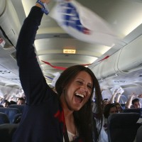 Passengers wave Rangers rally towels during their seven minute flight. (Photo by Matt Molnar)