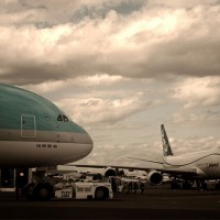 An Airbus A380 and Boeing 747-8 Freighter on display at the 2011 Paris Air Show. (Photo by Rohan Visvanathan, via Flickr, CC BY-NC-ND)