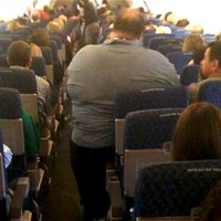 obese-man-on-plane-630