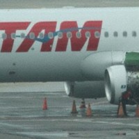 TAM Airbus A320 with broken engine cowling