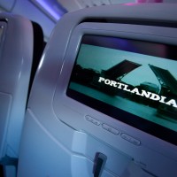 Portlandia plays on the RED entertainment system as we get airborne. (Photo by Jeremy Dwyer-Lindgren/NYCAviation)