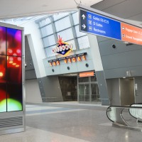 Terminal 3 is adorned with colorful signage. (Courtesy of Clark County Department of Aviation)