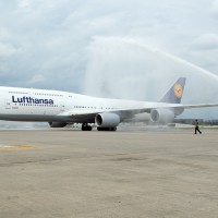 Lufthansa's first Boeing 747-8 Intercontinental (D-ABYA) receives a water cannon salute upon arrival at Washington Dulles. (Photo by Cary Liao/NYCAviation)