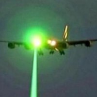 Green laser shining on an aircraft. (Photo by Dept of Transportation)