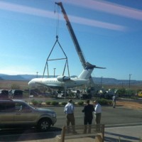 SkyWest Delta Connection CRJ being lifted out of a ditch by crane at St. George Airport in Utah. (Photo by KSL)