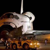 Space shuttle Endeavour is towed before dawn on September 14th from her storage in the Vehicle Assembly Building to the Space Shuttle Landing Facility to be hoisted on to the back of the SCA. (Photo by Suresh Atapattu)