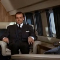 James Bond is about to give Goldfinger a physics lesson.