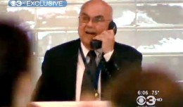 The former Father Harkins at work. (Photo by CBS 3)