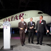 The first Qatar Airways Boeing 787 Dreamliner poses behind Boeing Commercial Airplanes CEO Ray Conner, Qatar Airways CEO Akbar Al Baker and Qatari Ambassador to the United States His Excellency Mohamed Bin Abdulla Al-Rumaihi. (Photo by Liem Bahneman/NYCAviation)
