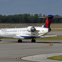 A Delta Connection Bombardier CRJ-900 operated by Mesaba Airlines. (Photo by caribb via Flickr, CC-BY-NC-ND)