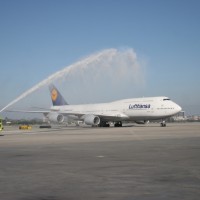 Lufthansa's first 747-8I service to Los Angeles gets a water cannon salute. (Photo by Stephen Shrank/NYCAviation)