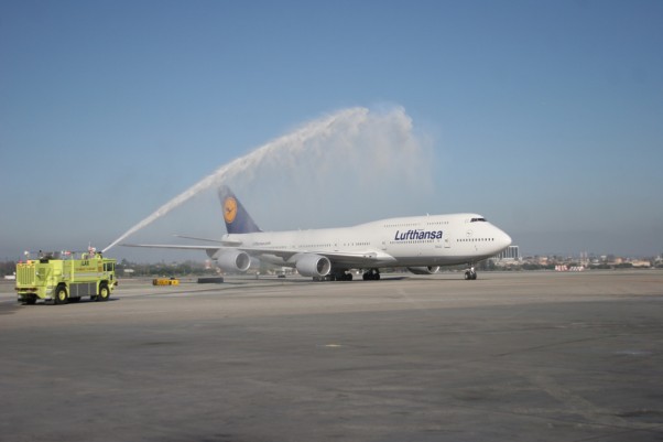 Lufthansa's first 747-8I service to Los Angeles gets a water cannon salute. (Photo by Stephen Shrank/NYCAviation)