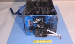 These are the remains of the lithium-ion battery that burst into flames inside a Boeing 787 last week. (Photo by NTSB)