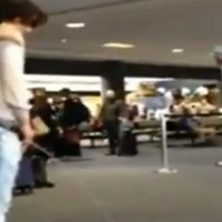 Brandon Pelletier urinates at LAX.