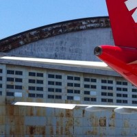 A TAM A330 sets the record for the world's largest refrigerator magnet.