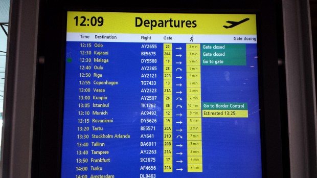 Flight Information Display at HEL shows approximate walking time, and gate direction