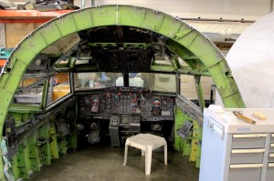 Once upon a time, this was the business end of a 727. Today it is being rebuilt into a fully functional movie set complete with switches that click and lights that glow.