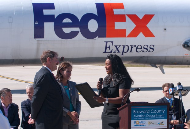 Broward County Mayor Barbara Sharief presents proclamation to David Sutton and Beth Rush from FedEx